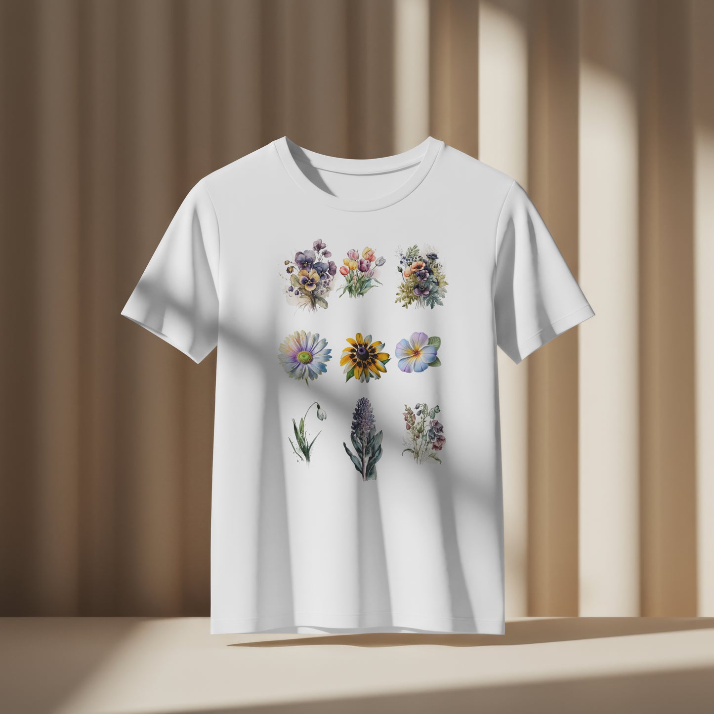 White t-shirt with a set of colorful floral tattoos on a white background on a beige background