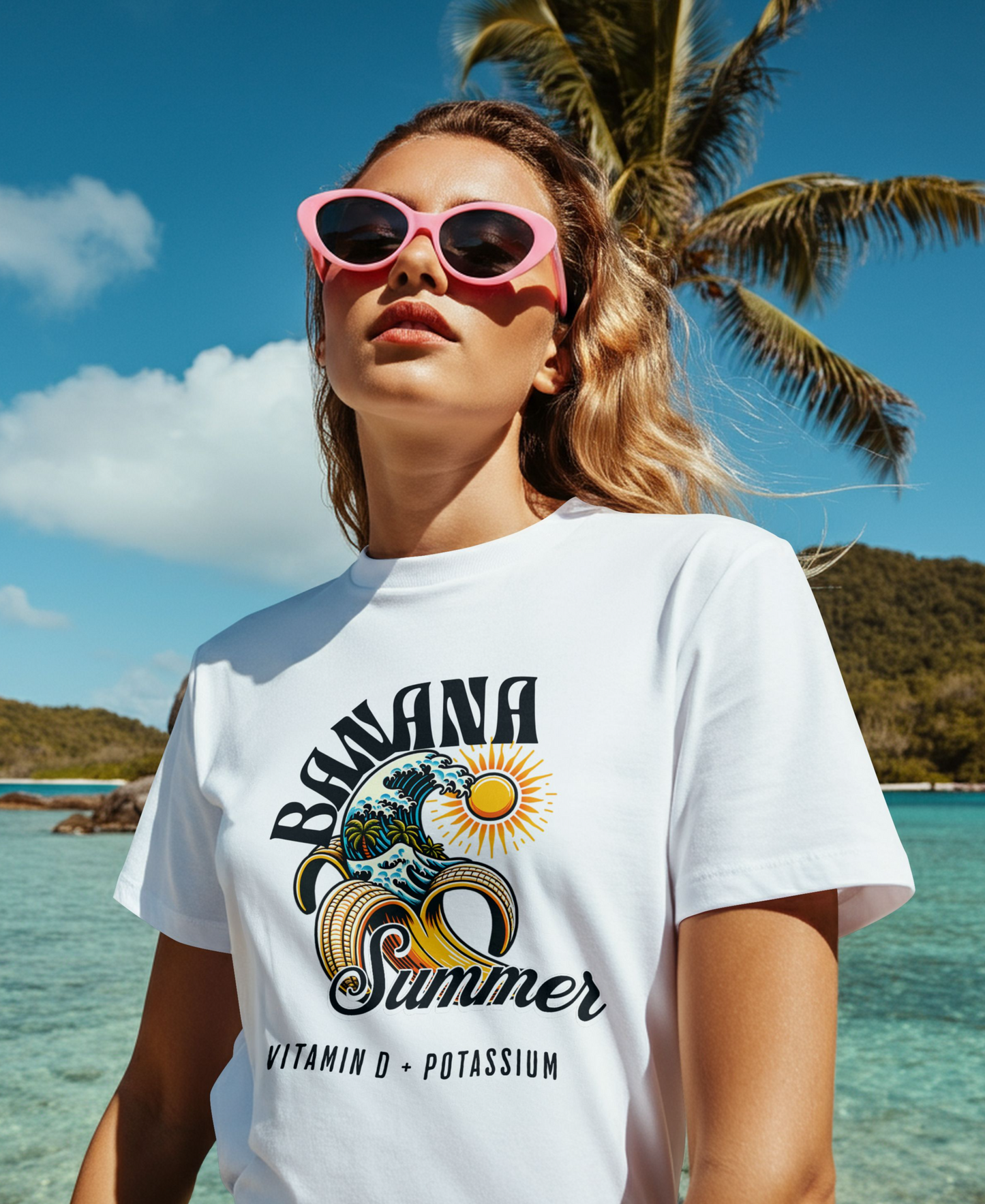 Woman wearing a 'Banana Summer' t-shirt with sunglasses on a beach