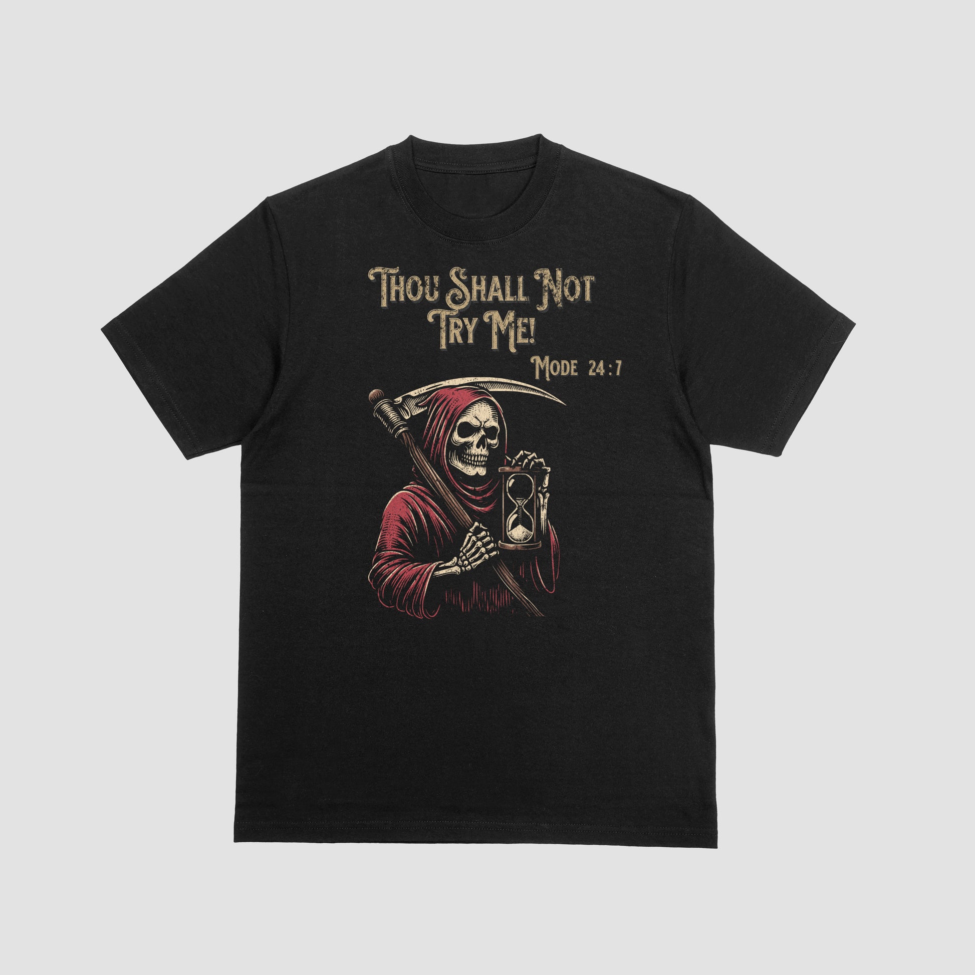 Black t-shirt with a Grim Reaper holding a hourglass with text 'Thou Shall Not Try Me! Mode 24:7' on a white background on a gray background